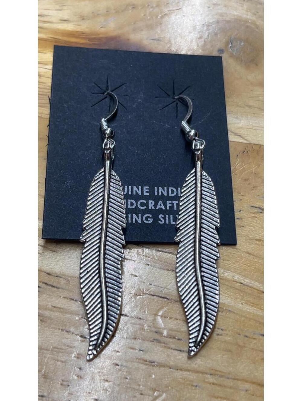Native American Zuni jewelry handmade sterling silver feather design silver work